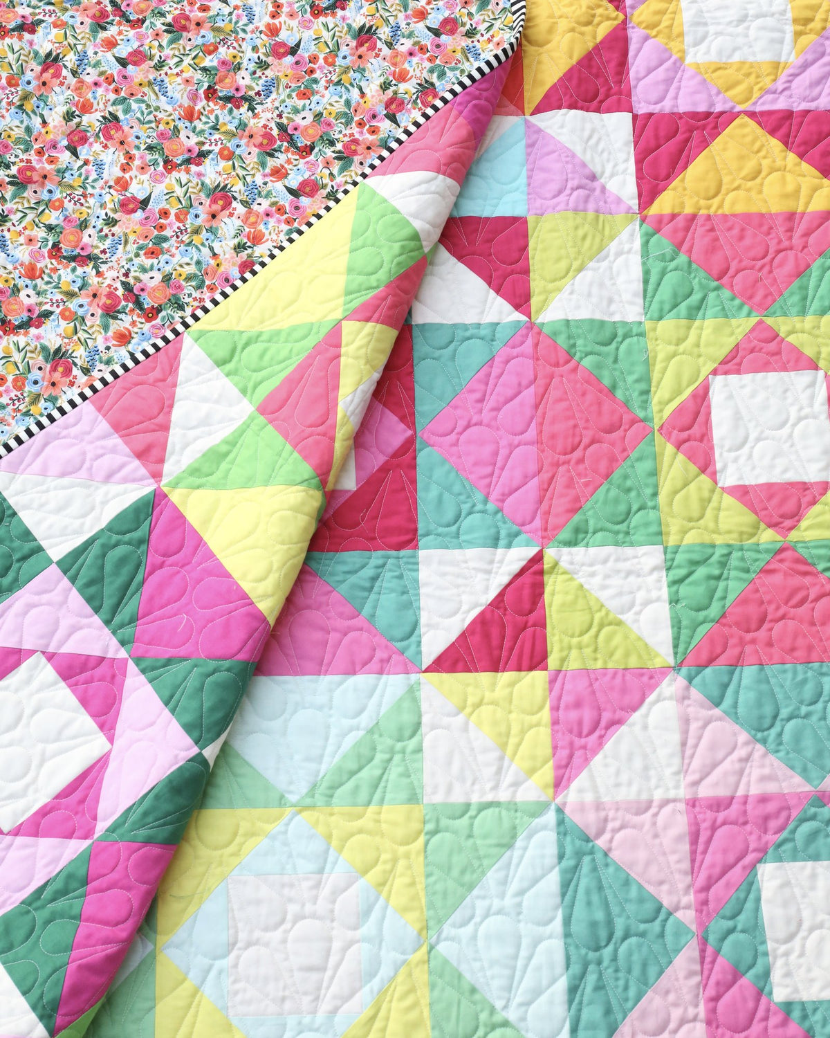 Close-up of scrappy Economy Stars blocks with a folded edge